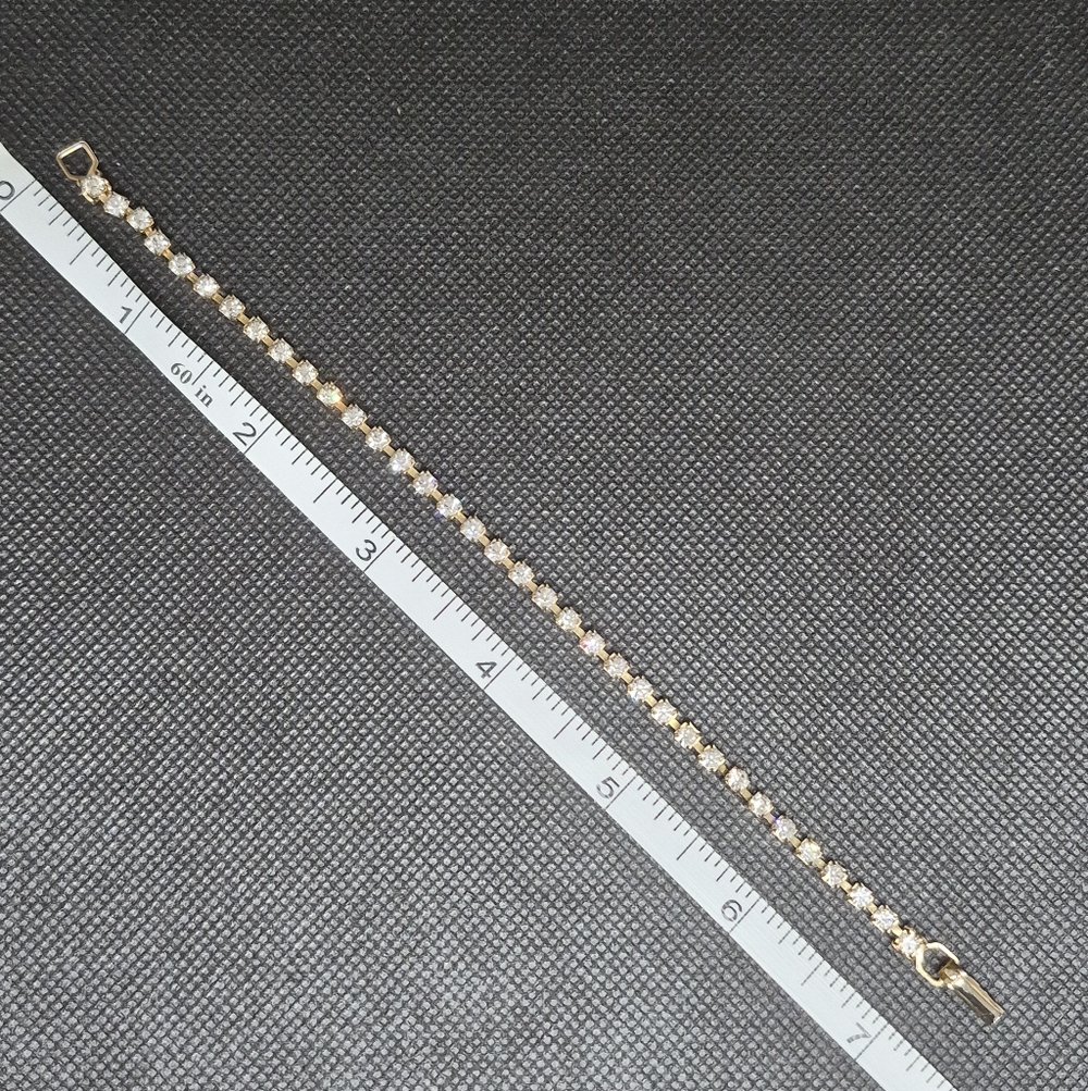 VINTAGE Clear Rhinestones in Gold Tone Setting Tennis Bracelet - Picture 11 of 14